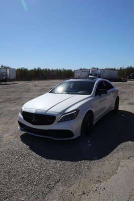 Mercedes CLS 63 S 
Chrome delete & roof wrap carbon fiber - This CLS 63 S came in for some subtle changes. His car came with the carbon fiber package from factory and wanted to do his roof in our gloss carbon fiber. He also wanted to get rid of all the chrome and we wrapped that gloss black.