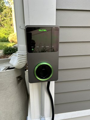 EV Charger - I installed EV charger, mounted on the corner board with wire run into a PVC conduit EV Charger - I installed EV charger, mounted on the corner board with wire run into a PVC conduit