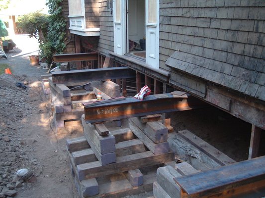 Lifting/Leveling old Victorian House - This was a turn of the Century Radiused Arched windows Victorian House had sunk over a foot and we dug it out. Shored entire West Side up and leveled out the house with Steel Beams and Hydraulicly operated house jacks. We remodeled all the windows and poured a brand new foundation Lifting/Leveling old Victorian House - This was a turn of the Century Radiused Arched windows Victorian House had sunk over a foot and we dug it out. Shored entire West Side up and leveled out the house with Steel Beams and Hydraulicly operated house jacks. We remodeled all the windows and poured a brand new foundation