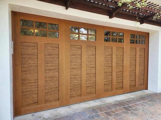 Wood Garage Doors - If you are going through a home renovation or looking to build a new construction home and you are after the wood style garage doors we've got you covered! We have endless design options to choose from to get the exact door you're after. Give us a call today so we can discuss your project.