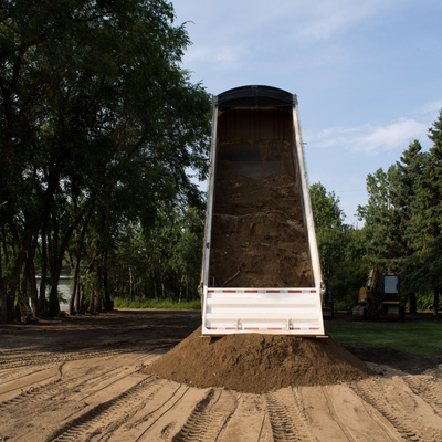We Deliver - Experience convenience at your doorstep with our reliable delivery service. From the grandeur of boulders to the fine details of decorative rock, we bring a comprehensive range of landscaping materials directly to you. Whether you’re enhancing your garden with topsoil, creating an elegant pathway with flagstone, or laying the foundation with pavers and turf, we’ve got you covered. Our efficient delivery service extends to include asphalt milling, gravel, and much more, ensuring that your landscaping projects are not only well-supplied but also hassle-free. Let us bring the materials you need right to your doorstep, so you can focus on bringing your outdoor vision to life. We Deliver - Experience convenience at your doorstep with our reliable delivery service. From the grandeur of boulders to the fine details of decorative rock, we bring a comprehensive range of landscaping materials directly to you. Whether you’re enhancing your garden with topsoil, creating an elegant pathway with flagstone, or laying the foundation with pavers and turf, we’ve got you covered. Our efficient delivery service extends to include asphalt milling, gravel, and much more, ensuring that your landscaping projects are not only well-supplied but also hassle-free. Let us bring the materials you need right to your doorstep, so you can focus on bringing your outdoor vision to life.