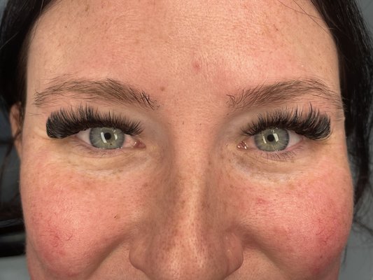 Volume Eyelashes - Using ultra fine lashes fanned together to create a dense full look across the lash line. Using anywhere from 2 to 25 .03m extensions, each fan is handmade and applied to a single natural lash ensuring there is no damage to the natural eyelashes. With the ability to customize the curl, length and diameter of the fan being applied, volume eyelashes have the ability to look like you are walking the red carpet or just like you are wearing mascara each day. .