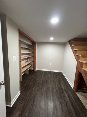 Interior paint and bathroom remodeling - Interior painting & flooring includes surface preparation, patching holes, sanding, primer as needed, and two coats of paint on walls and ceilings. Bathroom remodeling includes removal of old fixtures, installation of new vanity and toilet, flooring replacement, wall repairs, painting, and final finishing