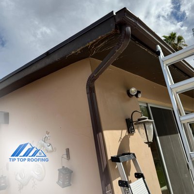 Gutter Services - Seamless Gutter Installation – Paradise Valley, AZ

We completed a custom seamless gutter installation for a luxury home in Paradise Valley. This project included professionally fitted aluminum gutters and downspouts designed to manage monsoon season water flow. The goal was to protect the property from water intrusion while maintaining the home's clean and elegant exterior.

Highlights:
• Seamless aluminum gutters
• Custom downspout placement
• Effective drainage layout for monsoon protection
• Color-matched finish to blend with home design

Whether it's a new build or a replacement project, we bring precision and reliability to every installation in Paradise Valley and across the Phoenix metro area.

2. Gutter Installation – Two-Story Home in Chandler, AZ

This Chandler homeowner was experiencing water pooling near the patio and front walkway. We designed a gutter system to solve the issue, installing a 12-foot section in the backyard and a 5-foot section in the front. Downspouts were placed strategically to redirect water away from the home's foundation.

Project Scope:
• Gutter system design & layout
• Seamless aluminum installation
• Strategic downspout placement
• Slope correction for proper water flow
• Rust-resistant materials for durability

The new gutter system not only solved the drainage problems but also maintained the visual appeal of the home's exterior.

3. New Gutter Installation – Chandler, AZ

In another Chandler project, we installed a full seamless gutter system using 6" aluminum gutters, custom-fit to match the home’s architecture. The system was carefully sloped to ensure optimal water flow and long-term protection from water damage.

Key Features:
• 6" seamless aluminum gutters
• Tailored fit and color matching
• Proper drainage slope to prevent overflow
• Fast, clean installation with professional finish

This project added both functionality and a clean, polished look to the home, giving the client lasting peace of mind.