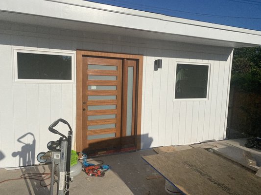 Garage conversion to ADU - Los Angeles - This started out as an old unused garage that we gutted and reframed to become a new ADU. We installed new windows and removed the old garage door. We redesigned the exterior to create a new wall and make the private entrance for the new studio. Also added a kitchenette and bathroom in the build making this a fully inhabitable ADU. Adding rental revenue potential. Garage conversion to ADU - Los Angeles - This started out as an old unused garage that we gutted and reframed to become a new ADU. We installed new windows and removed the old garage door. We redesigned the exterior to create a new wall and make the private entrance for the new studio. Also added a kitchenette and bathroom in the build making this a fully inhabitable ADU. Adding rental revenue potential.