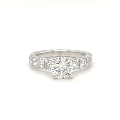 Graduated Diamond Ring Re-Design - We fully re-designed and custom made the finished ring, using the customers center stone. We used a "graduating style" diamond setting. Graduated Diamond Ring Re-Design - We fully re-designed and custom made the finished ring, using the customers center stone. We used a "graduating style" diamond setting.