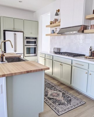 Maple Butcher Block and Floating Shelves - We helped this customer upgrade their builder grade kitchen by adding maple butcher block counters and maple floating shelves. Maple Butcher Block and Floating Shelves - We helped this customer upgrade their builder grade kitchen by adding maple butcher block counters and maple floating shelves.