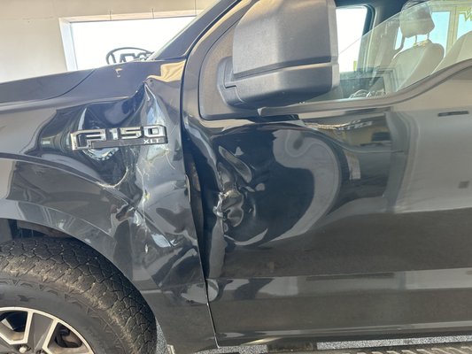 F-150 DEER COLLISION - A customer came to us with her Ford F-150 after hitting a deer, leaving substantial damage to the front end, including the hood, fender, driver door and headlight. She expressed deep concern about needing her truck back in time for a critical work event later that week. Our team immediately got to work, coordinating parts delivery and repairs with precision to ensure a quick turnaround. Not only did we meet her deadline, but we delivered the truck ahead of schedule, fully repaired and looking like new. The customer was thrilled and grateful for our dedication to her needs.