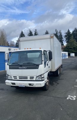 An equipped moving box truck - A moving box truck is equipped with rear roll-up doors for easy access, as well as a ramp, liftgate, moving blankets, dollies, hand trucks, and plastic wrap for secure and efficient loading of heavy items. An equipped moving box truck - A moving box truck is equipped with rear roll-up doors for easy access, as well as a ramp, liftgate, moving blankets, dollies, hand trucks, and plastic wrap for secure and efficient loading of heavy items.