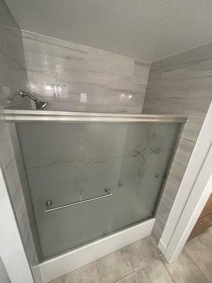 Bathroom Remodel Tub and Shower. - We installed a brand new Kholer Tub, all new plumbing, waterproofed shower walls, tile, shower niche and nice tub door for the finish. Finished drywall and re textured around the tub area and painted to match.