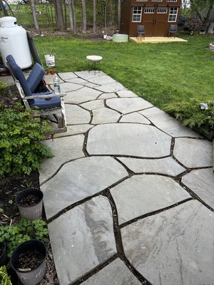 Slate patio regrout - Client had tried to use plants and make a natural looking patio, unfortunately plants never took. So they gave us a call and we installed fresh wide joint polymeric sand, giving this patio a whole new look! Slate patio regrout - Client had tried to use plants and make a natural looking patio, unfortunately plants never took. So they gave us a call and we installed fresh wide joint polymeric sand, giving this patio a whole new look!