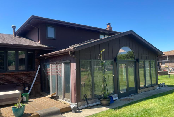 Exterior Remodel - We roof the home for this client in Homer Glen a few years ago. He asked us back for window replacement and new siding, soffit, fascia, gutters and downspouts with a redesign to his sunroom! Check out the before and after pics! Exterior Remodel - We roof the home for this client in Homer Glen a few years ago. He asked us back for window replacement and new siding, soffit, fascia, gutters and downspouts with a redesign to his sunroom! Check out the before and after pics!