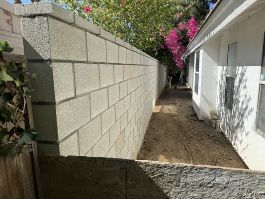 Cinder block wall - My clients wanted more privacy so i made them a 6ft tall wall with a cap finish Cinder block wall - My clients wanted more privacy so i made them a 6ft tall wall with a cap finish