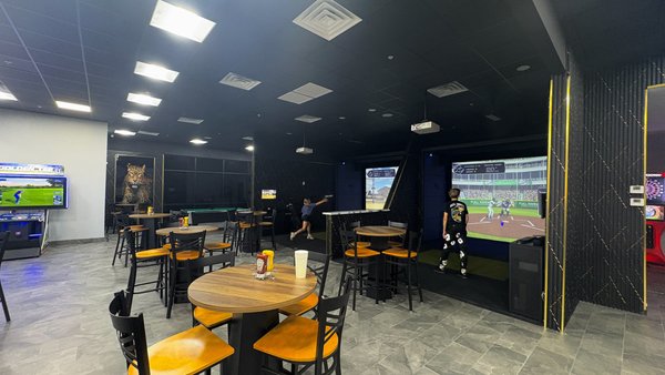 Sports Simulator - Not everyone in your group wants to play 18. That’s fine. We built this place for everybody.
Our Full Swing bays are designed for more than golf. Switch over to soccer, baseball, football, hockey, dodgeball, and more. Take penalty shots. Throw heat from the mound. Test your quarterback skills. Go head-to-head and make it competitive.
Rent a Full Swing Bay for 1, 2, or 3 hours and turn it into your own private arena. Bring the family. Bring your crew. Load up a sport and go.
The system tracks speed, accuracy, and performance in real time, so it feels legit without being complicated. Jump in and play. No learning curve. No waiting around.
And if you just want pure fun, we’ve got arcade games ready to go. Great for kids. Great for adults who still act like kids.
This is an easy win for:
Family outings
Birthday parties
Team events
Summer afternoons when it’s just too hot outside
You’re indoors. It’s cool. Drinks are cold. Everyone has something to do.
Come compete. Come laugh. Either way, rent a bay and make it your space for the day. Sports Simulator - Not everyone in your group wants to play 18. That’s fine. We built this place for everybody.
Our Full Swing bays are designed for more than golf. Switch over to soccer, baseball, football, hockey, dodgeball, and more. Take penalty shots. Throw heat from the mound. Test your quarterback skills. Go head-to-head and make it competitive.
Rent a Full Swing Bay for 1, 2, or 3 hours and turn it into your own private arena. Bring the family. Bring your crew. Load up a sport and go.
The system tracks speed, accuracy, and performance in real time, so it feels legit without being complicated. Jump in and play. No learning curve. No waiting around.
And if you just want pure fun, we’ve got arcade games ready to go. Great for kids. Great for adults who still act like kids.
This is an easy win for:
Family outings
Birthday parties
Team events
Summer afternoons when it’s just too hot outside
You’re indoors. It’s cool. Drinks are cold. Everyone has something to do.
Come compete. Come laugh. Either way, rent a bay and make it your space for the day.