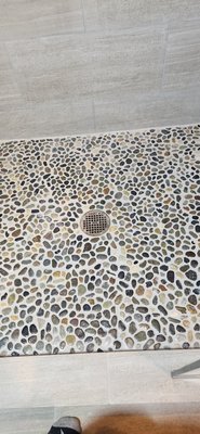 Shower floor Re-grout - This floor needed a new Grout replacement. the old floor had a sand based Grout wich was soiled and crumbling . Shower floor Re-grout - This floor needed a new Grout replacement. the old floor had a sand based Grout wich was soiled and crumbling .