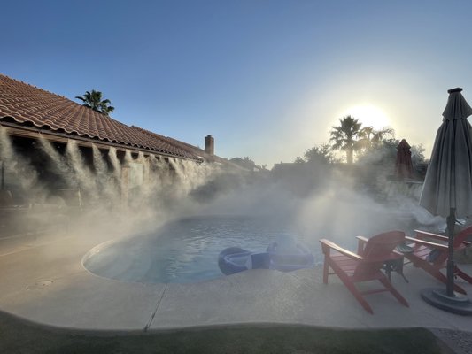 Mist System "Scott" - This homeowner enlisted our help to create his little piece of paradise in his backyard. Although he already had a pool to cool down in, he did not want to be limited to it when entertaining and lounging during our long, hot summer months.
We installed this 3 zone mist system which included a patio line, mist around pool waterfall for added effect and cooling around pool, and mist for upper lounge pool deck area.
A high-pressure pump (1,000 PSI) was used to power it all, with variable speed feature to allow the system to be operated all at once or in three separate areas (patio mist line, pool mist/fog feature, and upper pool deck area).
The pump creates a fine mist which cools the hot air, bringing the temperature down in the area. When the ambient temperature gets low enough, the mist creates a beautiful and cooling fog effect. Can you believe this yard is in the middle of Scottsdale, AZ?
A unique challenge on this project was:
In order to install the pool waterfall's mist, we had to route the line inside a planter wall that was behind the pool deck, go under it and cut out an existing plastic channel in the pool deck to allow the line to be taken up to the rock waterfall feature. A small channel was cut in between the mortar of the rocks to put the 3/8" mist line in to the 3 areas of the waterfall. After installation of the mist line we mortared it back and replaced the plastic joint cover, making for a truly custom and professional installation! Mist System "Scott" - This homeowner enlisted our help to create his little piece of paradise in his backyard. Although he already had a pool to cool down in, he did not want to be limited to it when entertaining and lounging during our long, hot summer months.
We installed this 3 zone mist system which included a patio line, mist around pool waterfall for added effect and cooling around pool, and mist for upper lounge pool deck area.
A high-pressure pump (1,000 PSI) was used to power it all, with variable speed feature to allow the system to be operated all at once or in three separate areas (patio mist line, pool mist/fog feature, and upper pool deck area).
The pump creates a fine mist which cools the hot air, bringing the temperature down in the area. When the ambient temperature gets low enough, the mist creates a beautiful and cooling fog effect. Can you believe this yard is in the middle of Scottsdale, AZ?
A unique challenge on this project was:
In order to install the pool waterfall's mist, we had to route the line inside a planter wall that was behind the pool deck, go under it and cut out an existing plastic channel in the pool deck to allow the line to be taken up to the rock waterfall feature. A small channel was cut in between the mortar of the rocks to put the 3/8" mist line in to the 3 areas of the waterfall. After installation of the mist line we mortared it back and replaced the plastic joint cover, making for a truly custom and professional installation!