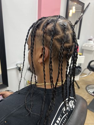 Men’s/ Twisted - Twists are braided into a spiral rope braid, also known as rope twists, and allow the extension of one's natural hair via dreadlocks or quality commercial textured strands Men’s/ Twisted - Twists are braided into a spiral rope braid, also known as rope twists, and allow the extension of one's natural hair via dreadlocks or quality commercial textured strands