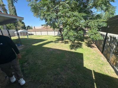 Tomahawk project - Whole back yard project. Old sod removal. Leveling ground to its best level and removing al debris. New sprinklers installation. New sod Installation and lawn rolling new sod for better compaction to ground.