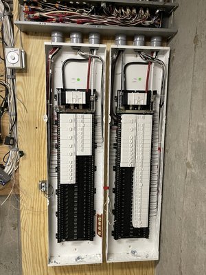 400 Amp Service Replacement - We recently completed a direct replacement of a 400 amp underground electrical service for a residential client. While the outdoor meter enclosure was in good condition, the interior panels, originally installed in 1985, were in desperate need of replacement.
Our team started by safely removing both outdated panels. To enhance organization and accessibility, we installed a trough above the new panels for all branch circuits. This setup makes future maintenance easier and ensures everything is neatly arranged.
Next, we carefully spliced the necessary wires and terminated each circuit into its respective breaker panel. Our focus on precision and safety standards ensured a smooth transition to the new service.
This upgrade not only enhances the reliability of the home’s electrical system but also improves overall efficiency, providing peace of mind for our client 400 Amp Service Replacement - We recently completed a direct replacement of a 400 amp underground electrical service for a residential client. While the outdoor meter enclosure was in good condition, the interior panels, originally installed in 1985, were in desperate need of replacement.
Our team started by safely removing both outdated panels. To enhance organization and accessibility, we installed a trough above the new panels for all branch circuits. This setup makes future maintenance easier and ensures everything is neatly arranged.
Next, we carefully spliced the necessary wires and terminated each circuit into its respective breaker panel. Our focus on precision and safety standards ensured a smooth transition to the new service.
This upgrade not only enhances the reliability of the home’s electrical system but also improves overall efficiency, providing peace of mind for our client