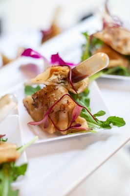 Event Catering - For this catered event, we had the pleasure of creating a fusion menu with Asian influence, featuring a selection of Hors d'oeuvres that were expertly crafted to bring together the best of different culinary traditions.
Our menu featured a wide variety of mouth-watering and beautifully presented bite-sized appetizers that incorporated flavors and ingredients from both Western and Asian cuisine. Guests enjoyed a range of delicious options, from our crispy chicken potstickers with plum sauce to our savory corn & cheese croquettes.
One of our most popular offerings was our roasted beet bites with honey and goat cheese, which brought together the fresh flavors of locally sourced beets with the tangy sweetness of honey and the creamy richness of goat cheese. Chef Abyssinia takes great pride in using only the freshest and highest quality ingredients to create each dish and is skilled in bringing out the best in every flavor.
Our goal is always to provide a unique and unforgettable dining experience that will leave a lasting impression on your guests. Event Catering - For this catered event, we had the pleasure of creating a fusion menu with Asian influence, featuring a selection of Hors d'oeuvres that were expertly crafted to bring together the best of different culinary traditions.
Our menu featured a wide variety of mouth-watering and beautifully presented bite-sized appetizers that incorporated flavors and ingredients from both Western and Asian cuisine. Guests enjoyed a range of delicious options, from our crispy chicken potstickers with plum sauce to our savory corn & cheese croquettes.
One of our most popular offerings was our roasted beet bites with honey and goat cheese, which brought together the fresh flavors of locally sourced beets with the tangy sweetness of honey and the creamy richness of goat cheese. Chef Abyssinia takes great pride in using only the freshest and highest quality ingredients to create each dish and is skilled in bringing out the best in every flavor.
Our goal is always to provide a unique and unforgettable dining experience that will leave a lasting impression on your guests.