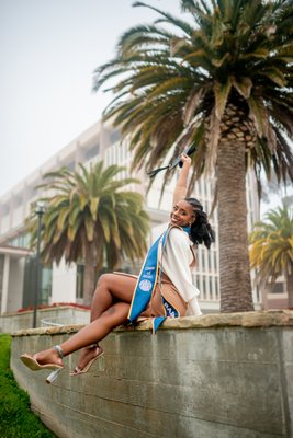 Ellecse's Grad Photos | UC Santa Barbara - No need for sunny skies for great photos, in fact a lot of the time in the photography game we have to work with what we got. We shot this in an evening overcast, which actually gave us more creative freedom to execute the vision she had for her graduation photos.

I'm confident in giving just about anyone posing direction for portraits, and as you can see Ellecse executed beautifully. Having known her since she started at UCSB, I'm grateful to have had the opportunity to work with her to create these beautiful memories for her and her loved ones.