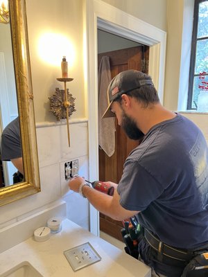 Adding in Sconces in Bathroom - 🌿 New Sconce Installation & Switch Wiring Repair — Marietta, GA
This homeowner wanted to upgrade their space with a new wall sconce, but the existing switch wiring wasn’t functioning correctly. We traced and corrected the faulty wiring, ensured the switch controlled the light properly, and installed a new fixture securely and to code.
Once the wiring was repaired, we mounted the sconce, made clean terminations, and verified proper operation with the updated switch. The result is a safe, reliable, and beautifully finished lighting upgrade that adds both style and function to the room.
💡 Service provided: New sconce installation + switch wiring repair
📍 Location: Marietta, Georgia
🏠 Result: Fully operational switch and a fresh fixture that brightens the space safely and seamlessly Adding in Sconces in Bathroom - 🌿 New Sconce Installation & Switch Wiring Repair — Marietta, GA
This homeowner wanted to upgrade their space with a new wall sconce, but the existing switch wiring wasn’t functioning correctly. We traced and corrected the faulty wiring, ensured the switch controlled the light properly, and installed a new fixture securely and to code.
Once the wiring was repaired, we mounted the sconce, made clean terminations, and verified proper operation with the updated switch. The result is a safe, reliable, and beautifully finished lighting upgrade that adds both style and function to the room.
💡 Service provided: New sconce installation + switch wiring repair
📍 Location: Marietta, Georgia
🏠 Result: Fully operational switch and a fresh fixture that brightens the space safely and seamlessly
