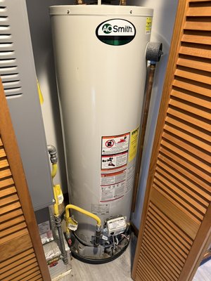 Water heater replacement - This is a 40 gallon A.O smith to Rheem water heater replacement. The old water heater had 3” smoke pipe which is against code. We installed a new smoke pipe wye 6”x4”x4” and installed new 4” smoke pipe from the wye to the water heater, which is code. Also the cold water piping valve is new. This is due to the water heater being taller than the existing water heater.