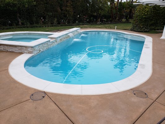 Villa Park Remodel - The original pool was built in the 1970's. We removed the old spa that was close to the house and placed new larger spa on the back of the pool facing the house so the owner could see a water feature. The coping was replaced with Pacific Stone precast coping, the decking was replaced with colored Top Cast finish concrete. Villa Park Remodel - The original pool was built in the 1970's. We removed the old spa that was close to the house and placed new larger spa on the back of the pool facing the house so the owner could see a water feature. The coping was replaced with Pacific Stone precast coping, the decking was replaced with colored Top Cast finish concrete.