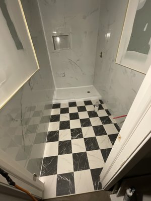 Full Bathroom Remodel - Full bathroom remodel - 24x24 wall tiles porcelain white carrara with 1/16 grout line - white and black marble checker on floor - custom niche Full Bathroom Remodel - Full bathroom remodel - 24x24 wall tiles porcelain white carrara with 1/16 grout line - white and black marble checker on floor - custom niche