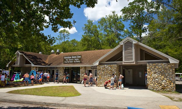 Services & Dining - Souvenirs, tee shirts, swimming and paddling supplies, picnic supplies, sunscreen and sundries are also available at the General Store, located at the South Entrance. A counter service restaurant is also available here, serving hot and cold food, ice cream and soft drinks.
Ticket windows in the front of the General Store sell transportation wristbands for the park tram servicing primarily those tubing the Ichetucknee, as well as van/bus transportation for paddlers to the river’s headwaters at the North Entrance. Services & Dining - Souvenirs, tee shirts, swimming and paddling supplies, picnic supplies, sunscreen and sundries are also available at the General Store, located at the South Entrance. A counter service restaurant is also available here, serving hot and cold food, ice cream and soft drinks.
Ticket windows in the front of the General Store sell transportation wristbands for the park tram servicing primarily those tubing the Ichetucknee, as well as van/bus transportation for paddlers to the river’s headwaters at the North Entrance.
