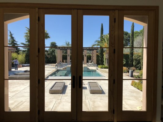Motorized Roller Shades for Privacy - This family had one of the nicest backyards I’ve seen. Their cabana was awesome but the sun was intense and there was no privacy for people inside. These transparent motorized rollers give them the privacy they desired, keeps the air conditioning cost down, and they didn’t sacrifice the view.