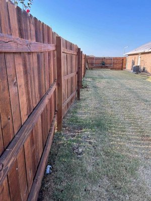 fence repair and stain application - this was a fence repair after a big storm snapped the posts and blew down part of the fence we also added a semi transparent protectant/stain to protect against the elements and bring it back to life.