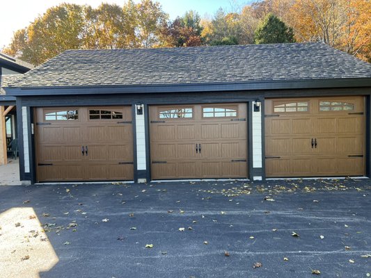 Garage door replacement in Hartford, Wisconsin  - Customers request to replace old wooden garage doors, but still wanted to keep that wood look but with steel doors with R 14 insulation value and insulated glass tops  Garage door replacement in Hartford, Wisconsin  - Customers request to replace old wooden garage doors, but still wanted to keep that wood look but with steel doors with R 14 insulation value and insulated glass tops 