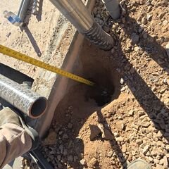 Electrical panel attached to an SRP approved “H” frame - This job required a lot of demolition and re-installation of concrete and wiring for a separate building on a property.