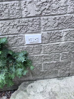 Outdoor wall plug BUBBLE COVER installation - The first photo shows a wall plate that does not meet safety standards, installed on an outdoor wall plug. This image highlights the dangers of using improper electrical setups. The wall plate is not weatherproof, which means that rain and moisture can get inside. This can cause problems like short circuits, electrical fires, or even shocks, especially during bad weather. Additionally, the old design of the wall plate looks outdated and does not follow modern Ontario Electrical safety rules. This photo reminds us how important it is to follow electrical codes and regulations, which are there to keep people and property safe from electrical risks.
In contrast, the second photo shows a "bubble cover" that has been correctly installed over the outdoor wall plug. This cover is made for outdoor use and protects the plug from water, dust, and other outdoor elements. Its clear dome shape lets you see the plug while keeping it safe from rain and debris. Installing this bubble cover not only meets safety standards but also makes the electrical system safer and more functional. This change reflects a commitment to doing electrical work the right way and shows how a simple upgrade can greatly improve safety and compliance.
Comparing these two photos for this project highlights why it's so important to have safe electrical installations outdoors. By replacing the unsafe wall plate with a bubble cover, we follow safety rules and show responsibility in electrical work. This project reminds homeowners, and other property owners to regularly check and update outdoor electrical systems, especially in areas that face harsh weather. It is crucial to prioritize safety and ensure all outdoor electrical installations are protected properly. Outdoor wall plug BUBBLE COVER installation - The first photo shows a wall plate that does not meet safety standards, installed on an outdoor wall plug. This image highlights the dangers of using improper electrical setups. The wall plate is not weatherproof, which means that rain and moisture can get inside. This can cause problems like short circuits, electrical fires, or even shocks, especially during bad weather. Additionally, the old design of the wall plate looks outdated and does not follow modern Ontario Electrical safety rules. This photo reminds us how important it is to follow electrical codes and regulations, which are there to keep people and property safe from electrical risks.
In contrast, the second photo shows a "bubble cover" that has been correctly installed over the outdoor wall plug. This cover is made for outdoor use and protects the plug from water, dust, and other outdoor elements. Its clear dome shape lets you see the plug while keeping it safe from rain and debris. Installing this bubble cover not only meets safety standards but also makes the electrical system safer and more functional. This change reflects a commitment to doing electrical work the right way and shows how a simple upgrade can greatly improve safety and compliance.
Comparing these two photos for this project highlights why it's so important to have safe electrical installations outdoors. By replacing the unsafe wall plate with a bubble cover, we follow safety rules and show responsibility in electrical work. This project reminds homeowners, and other property owners to regularly check and update outdoor electrical systems, especially in areas that face harsh weather. It is crucial to prioritize safety and ensure all outdoor electrical installations are protected properly.