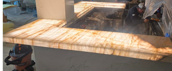 Translucent Stone Options - Discover the beauty of translucent natural stone with premium slabs featuring unique colors, patterns, and natural movement. These stones can create a stunning illuminated effect when paired with backlighting, making them a perfect choice for luxury home renovations, kitchen remodeling, bathroom remodeling, custom countertops, feature walls, statement pieces, and high-end architectural projects. Visit Legacy Stone and Marble to explore available natural stone slabs and find the perfect material for your next project.
Our selection includes translucent marble, onyx, quartzite, natural stone slabs, backlit stone, translucent stone panels, and exotic stone. Each slab is naturally unique, offering distinctive veining, textures, and color variations that can transform residential and commercial spaces. Translucent Stone Options - Discover the beauty of translucent natural stone with premium slabs featuring unique colors, patterns, and natural movement. These stones can create a stunning illuminated effect when paired with backlighting, making them a perfect choice for luxury home renovations, kitchen remodeling, bathroom remodeling, custom countertops, feature walls, statement pieces, and high-end architectural projects. Visit Legacy Stone and Marble to explore available natural stone slabs and find the perfect material for your next project.
Our selection includes translucent marble, onyx, quartzite, natural stone slabs, backlit stone, translucent stone panels, and exotic stone. Each slab is naturally unique, offering distinctive veining, textures, and color variations that can transform residential and commercial spaces.