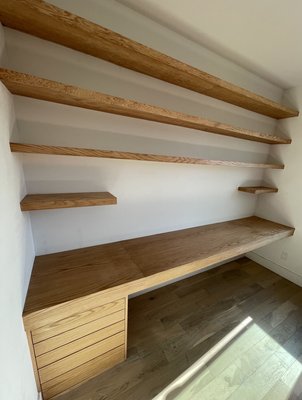 Custom-designed home office - Customized floating shelves, desk and set of drawers.
