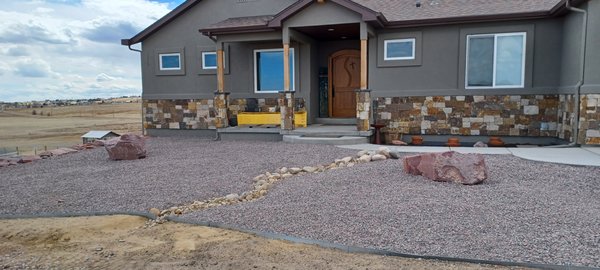 Xeriscape in The Country - I did this job for friends in the county who wanted a rock barrier around their home to help protect it from fire and to cut down on the amount of dirt getting into their house. They hired me to create a design for the outside of their home that is not only functional but beautiful as well. For this project I used a couple different rock colors and different rock sizes for interest. Xeriscape in The Country - I did this job for friends in the county who wanted a rock barrier around their home to help protect it from fire and to cut down on the amount of dirt getting into their house. They hired me to create a design for the outside of their home that is not only functional but beautiful as well. For this project I used a couple different rock colors and different rock sizes for interest.