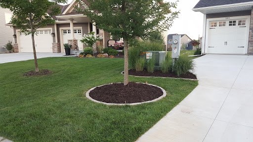 Decorative planting and mulch areas - Decorative rock, plant, and mulch installations.