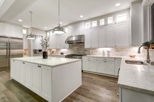 Kitchen remodel 2023 - A bustling kitchen filled with laughter, clinking glasses, and the irresistible aroma of a home-cooked meal Kitchen remodel 2023 - A bustling kitchen filled with laughter, clinking glasses, and the irresistible aroma of a home-cooked meal
