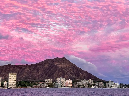 Sunset Cruise - End your day with an intimate and relaxing sunset sail. Grab a beverage of your own or one of our signature, local cocktails and settle in as we hoist the sails and head out toward Diamond Head. A private charter is perfect for those wanting to really experience Hawaii’s laid-back vibe. As the day goes on the trade winds lay down and the water smoothes out. It’s a great time of day to take a dip and have a beverage on the magic carpet. Take a rinse with a fresh water shower and settle in to watch the setting sun illuminate Diamond Head Crater, with the sparkle of Waikiki’s skyline lighting up just after the sun goes down. Oahu is known for spectacular sunsets all year round. On Friday Night, add a Fireworks Cruise for a little extra pizazz to your sunset cruise! Sunset Cruise - End your day with an intimate and relaxing sunset sail. Grab a beverage of your own or one of our signature, local cocktails and settle in as we hoist the sails and head out toward Diamond Head. A private charter is perfect for those wanting to really experience Hawaii’s laid-back vibe. As the day goes on the trade winds lay down and the water smoothes out. It’s a great time of day to take a dip and have a beverage on the magic carpet. Take a rinse with a fresh water shower and settle in to watch the setting sun illuminate Diamond Head Crater, with the sparkle of Waikiki’s skyline lighting up just after the sun goes down. Oahu is known for spectacular sunsets all year round. On Friday Night, add a Fireworks Cruise for a little extra pizazz to your sunset cruise!