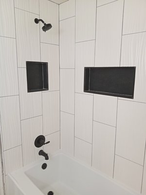 Bathroom remodel - This remodel was done on a old bathroom, we demo the the old bathroom and updated it with new tiles and a fresh design to match the newly renovated home.