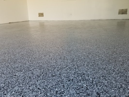 Midnight blended flakes showing. One day epoxy flake installation. - Call now for a free estimate! Midnight blended flakes showing. One day epoxy flake installation. - Call now for a free estimate!