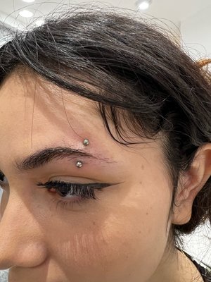 Eyebrow Piercings - We offer a wide variety of piercing options! We can pierce your eyebrow with a variety of different  jewelry options as well, ranging from implant grade titanium, opal and crystal ends, even 14k gold!
As an APP studio we have high standards of cleaning and professional pierces that will take you step by step in a calm piercing process.