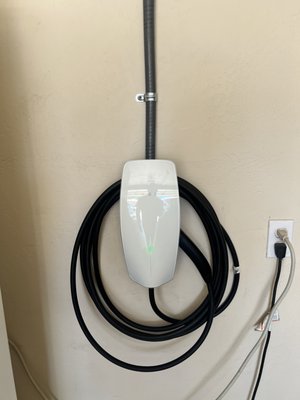 EV Charger Install - This Install was an install where the customer wanted an EV Charger in there garage and there was no accessible attic space so we had to install a conduit down to the charger. The customer was happy that it was placed where they wanted it. EV Charger Install - This Install was an install where the customer wanted an EV Charger in there garage and there was no accessible attic space so we had to install a conduit down to the charger. The customer was happy that it was placed where they wanted it.