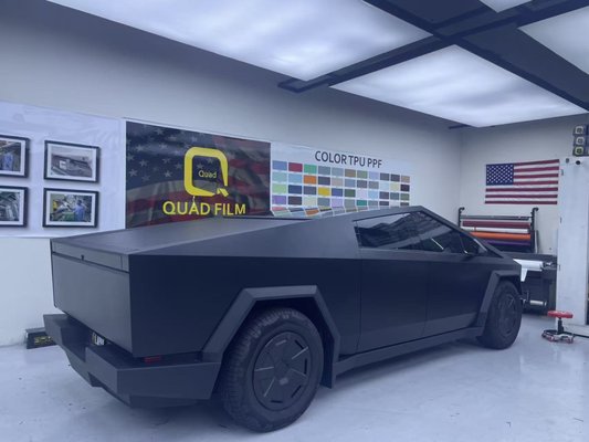 Tesla Cybertruck Matte Black Wrap - Freshly completed Tesla Cybertruck wrap in matte black. This full wrap gives the truck a clean satin-black finish with a bold, stealth look. Installed today and completed in just one day by QD Auto Image.