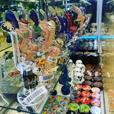Products - We have a premium selection of lab tested D9 & D8 Edible Gummies, D9 & D8 Syrups, D8 & THCO & THCP Cartridges, D8 & THCP Flower, D8 & THCO & THCP Concentrate & Live Resin, Hookahs & Shisha, American Hand Blown Water Pipes, Cookies Branded Apparel & Smoking Accessories, Raw Papers Apparel & Smoking Accessories, 100+ different kinds of Rolling Papers & Hemp Wraps, Swisher Sweet cigarillos, Premium Cigars, Drew Estates, Acid, Gurkha, Alex Bradley, Cohiba, Diesel and more.