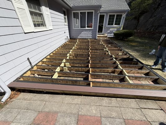 Two-Tone AZEK Patio Deck - This deck resurfacing was completed in three days and was completed using AZEK Premium decking. The customer enjoyed the two-tone approach with the picture frame.