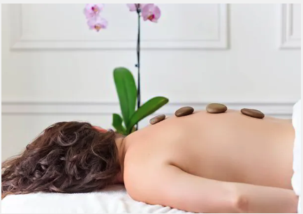Hot Stone Massage - A full body massage using hot basalt smooth stones to relieve muscle tension. The heat from the stones soften muscles and relaxes the body to help speed muscle recovery.
Massage oil is used to enhance the experience by allowing hot stones to glide on the skin promoting peace and calmness during the massage. Hot Stone Massage - A full body massage using hot basalt smooth stones to relieve muscle tension. The heat from the stones soften muscles and relaxes the body to help speed muscle recovery.
Massage oil is used to enhance the experience by allowing hot stones to glide on the skin promoting peace and calmness during the massage.