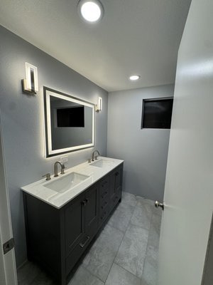 Bathroom remodeling - This bathroom remodel completely modernized a dated space into a clean, spa-inspired retreat. The project included a walk-in glass shower, large-format tile, a floating vanity with quartz countertops, updated lighting, and modern fixtures. The new layout improves functionality while delivering a sleek, timeless design.
If you’d like, tell me:
• The style (modern, farmhouse, luxury, budget-friendly, etc.)
• Size (half bath, master bath, guest bath)
• Any standout features (heated floors, custom cabinetry, smart mirror, etc.)
I can tailor it specifically to your project so it sounds unique and high-end. Bathroom remodeling - This bathroom remodel completely modernized a dated space into a clean, spa-inspired retreat. The project included a walk-in glass shower, large-format tile, a floating vanity with quartz countertops, updated lighting, and modern fixtures. The new layout improves functionality while delivering a sleek, timeless design.
If you’d like, tell me:
• The style (modern, farmhouse, luxury, budget-friendly, etc.)
• Size (half bath, master bath, guest bath)
• Any standout features (heated floors, custom cabinetry, smart mirror, etc.)
I can tailor it specifically to your project so it sounds unique and high-end.